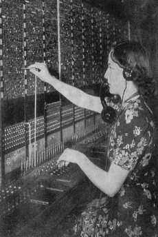 A picture of June Wright at work in the telephone exchange